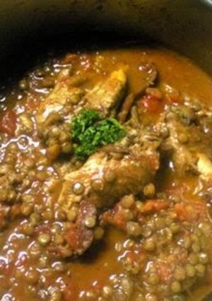 A picture of Chicken Wings Stewed in Tomato Sauce with Lentils.