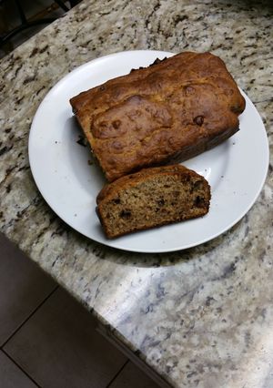 A picture of Banana bread with walnuts & chocolate chip.
