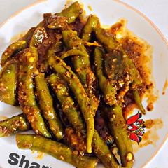 A picture of Green chillies Pickle.