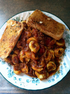 A picture of My Homemade Spaghetti Sauce w/ Tortellini.