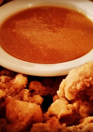 A picture of Popcorn Chicken Thighs with Tangy Sweet and Sour Sauce.
