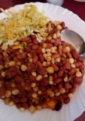 A picture of Githeri served with steamed cabbage.