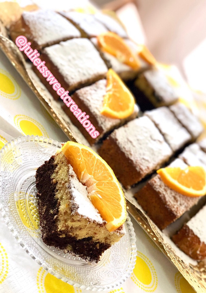Una foto de Bizcocho de naranja y chocolate 🍊🍫