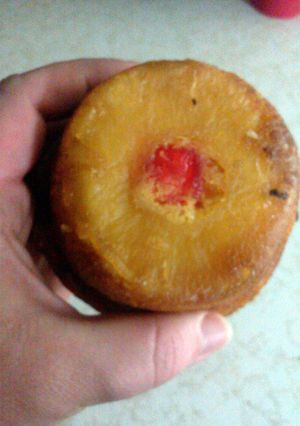A picture of pineapple upside down cupcake/muffin.