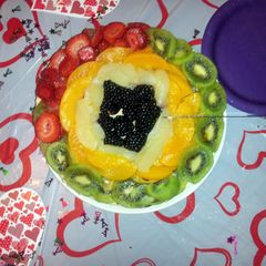 A picture of Cheesecake with fruit toppings ....