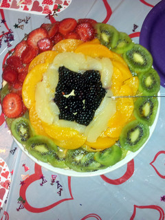 A picture of Cheesecake with fruit toppings ....