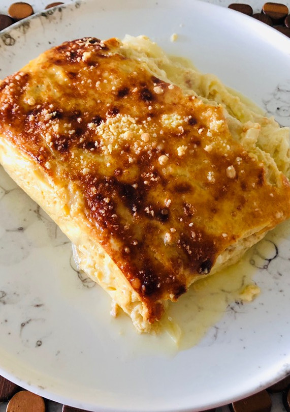 Una foto de Pastel de cebollas y queso
