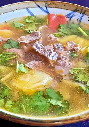 Hình của món Canh thịt bò nấu thơm cà.