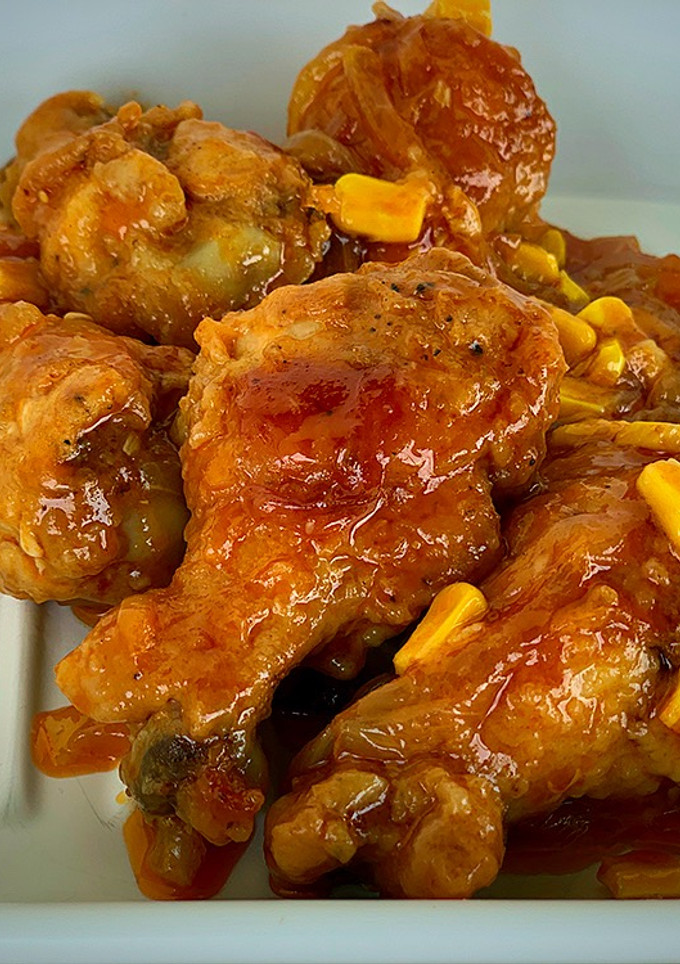 Una foto de Alitas de pollo al Appletiser