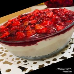 A picture of Whosayna’s Vanilla Mocha Mousse topped with Strawberry Sauce.
