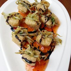 A picture of Bean Curd Puff Stuffed Bean Sprouts.