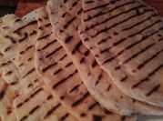 A picture of garlic naan bread