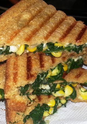 A picture of Spinach and corn sandwich.