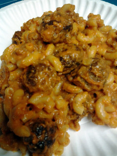 A picture of macaroni meatballs and meat and cheese sauce.
