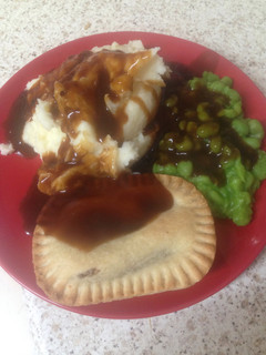 A picture of Steak Pie, Mash Potatoes, Peas & Thick Gravy. Yummy and Easy! 😀😊.