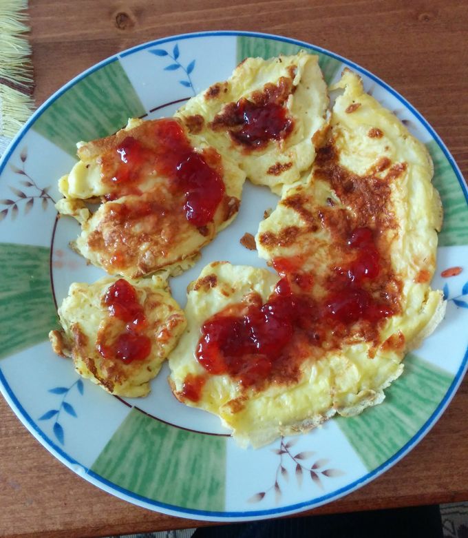 A picture of Polish omelette with jam.
