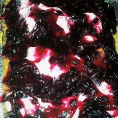 A picture of Blueberry candied yams with almonds.