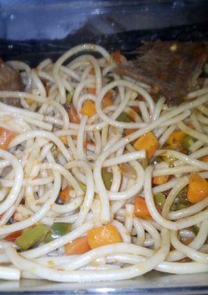A picture of Spaghetti with veggies.