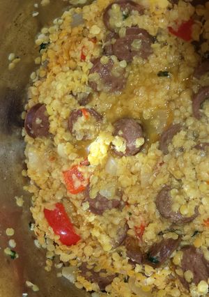 A picture of Red lentils and spicy sausage.