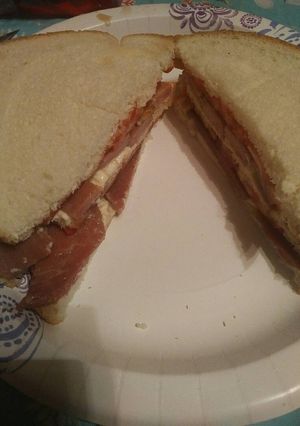 A picture of Leftover New Years Day Ham and Tomato Triple.