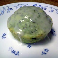 A picture of Lemon Poppy Zucchini Muffins with Lemon Glaze.