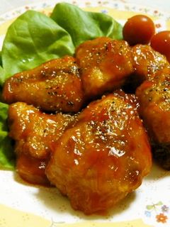 A picture of Fried Mackerel with Ketchup Sauce.