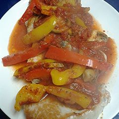 A picture of Pan seared pork loin with pizzaiola sauce.
