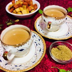 A picture of Ginger, cardamom masala tea or chai.