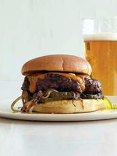 A picture of Cheddar-and-Onion Smashed Burgers.