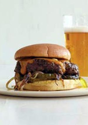 A picture of Cheddar-and-Onion Smashed Burgers.