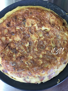 Una foto de Tortilla de patatas con cebolla