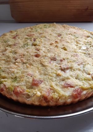 Una foto de Tarta de cebolla, puerros y panceta