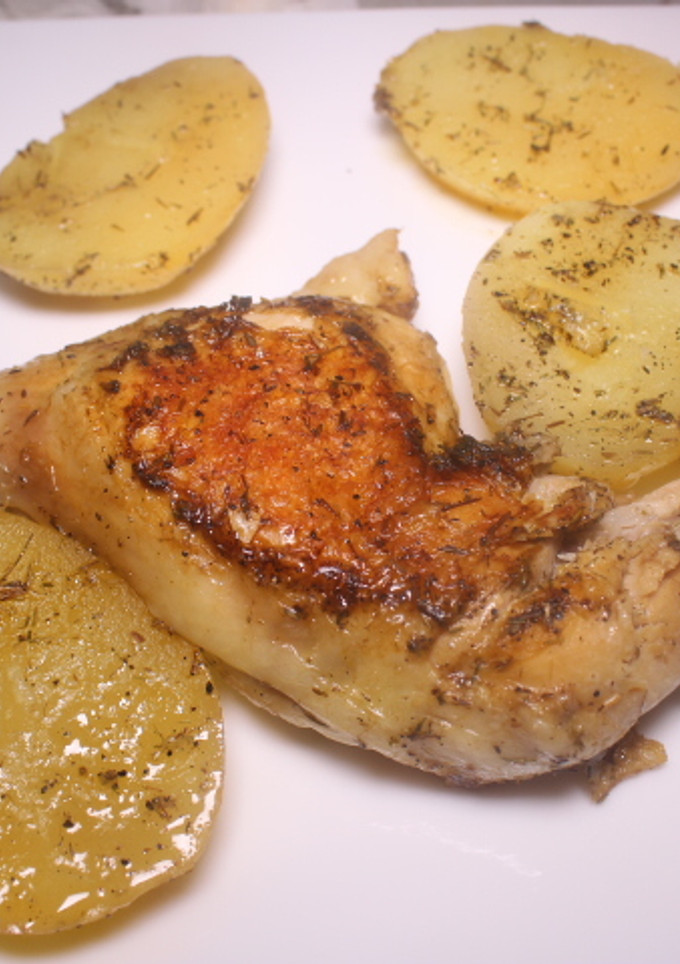 Una foto de Contramuslos de pollo con patatas y limón