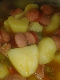 A picture of Potatoes and sausage.