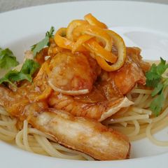 A picture of Spaghetti And Salmon In Orange Ginger Sauce.