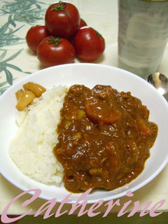 A picture of Pork and Sugar Tomato Fruit Curry.