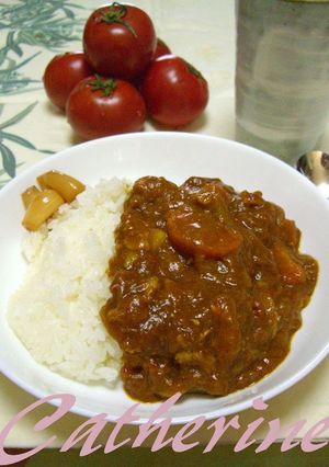 A picture of Pork and Sugar Tomato Fruit Curry.