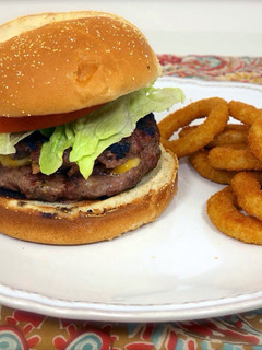 A picture of Bacon Mushroom Stuffed Cheese Burgers.