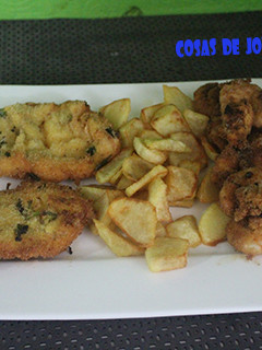 Una foto de Gambas y lomo con doble empanado