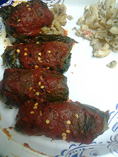 A picture of Stuff grape leaves with meat and rice.