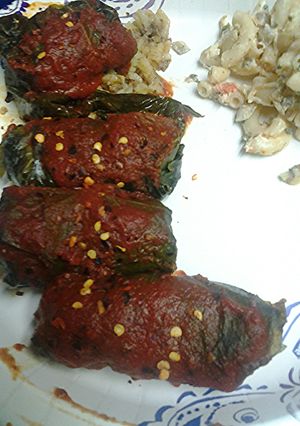 A picture of Stuff grape leaves with meat and rice.