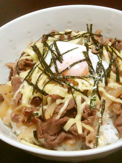 A picture of Beef Rice Bowl with Cheese & Poached Egg.