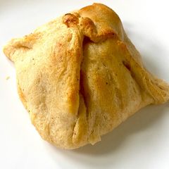 A picture of Chicken and bacon stuffed croissants.
