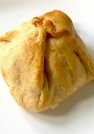 A picture of Chicken and bacon stuffed croissants.