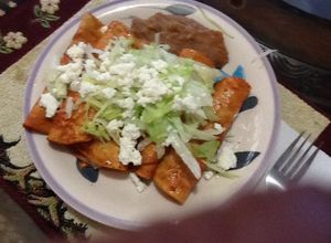 Una foto de Enchiladas de queso y cebolla