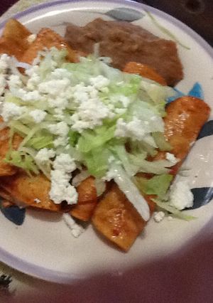 Una foto de Enchiladas de queso y cebolla