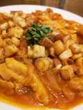 Guatitas a la española con papas fritas