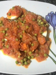 Una foto de Huevos con tomate
