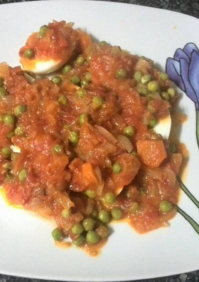 Una foto de Huevos con tomate