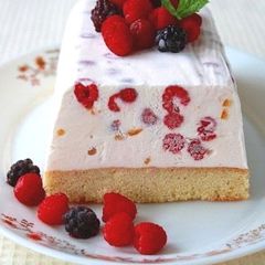 A picture of Citrus Ice Cream Cake with Berries and Yogurt.